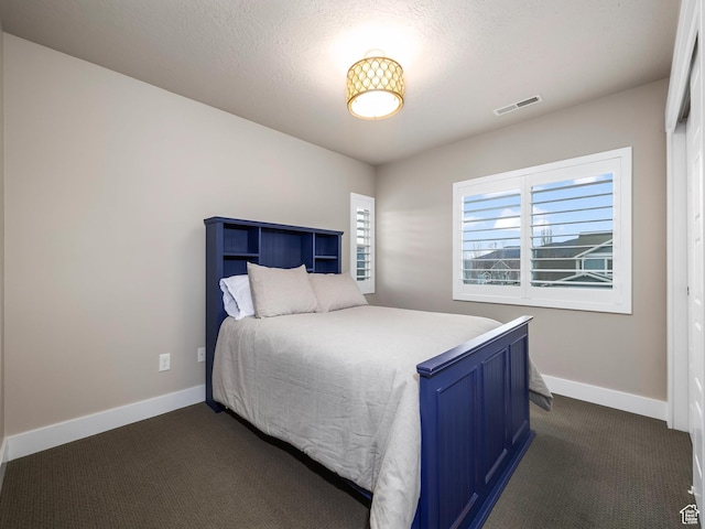 2654 E Water Wheel Ct, Heber City, UT 84032 - carpeted bedroom with a textured ceiling
