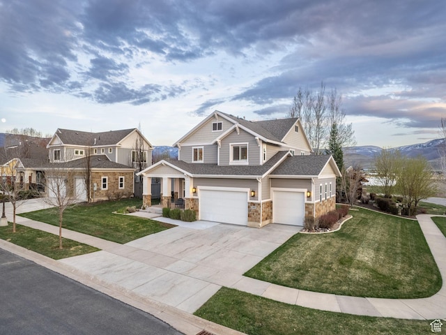 2654 E Water Wheel Ct, Heber City, UT 84032 - craftsman-style house featuring a garage, a mountain view, and a front yard