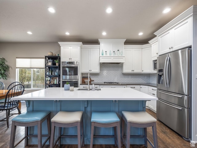 2654 E Water Wheel Ct, Heber City, UT 84032 - kitchen with white cabinetry, sink, stainless steel appliances, and a center island with sink