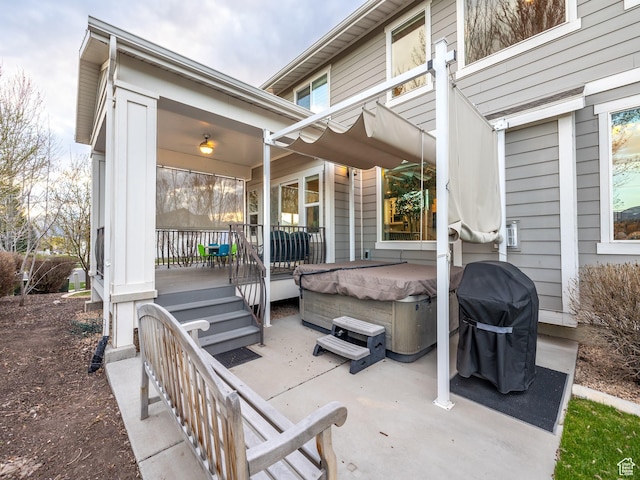 2654 E Water Wheel Ct, Heber City, UT 84032 - view of patio with area for grilling, a hot tub, and a pergola