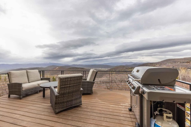 1555 Aerie Cir, Park City, UT 84060 - wooden terrace featuring a mountain view, an outdoor living space, and a grill