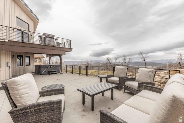 1555 Aerie Cir, Park City, UT 84060 - view of patio with a balcony, an outdoor living space, a hot tub, and a mountain view