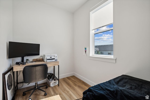 bedroom with light wood-type flooring