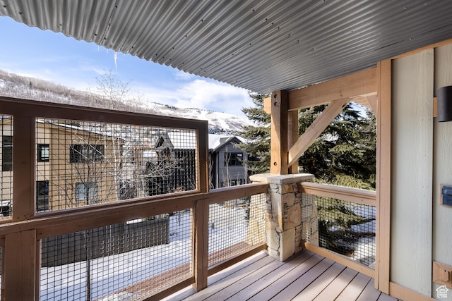 view of snow covered deck