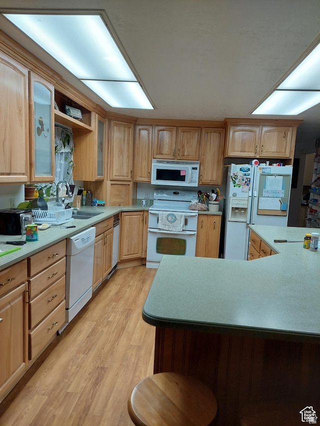 865 N 1250th St W, Provo, UT 84604 - kitchen with white appliances, sink, light brown cabinets, and light wood-type flooring