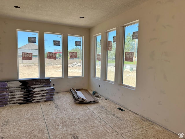 11202 S 1000 E Unit 3, Sandy, UT 84094 - unfurnished room with a textured ceiling