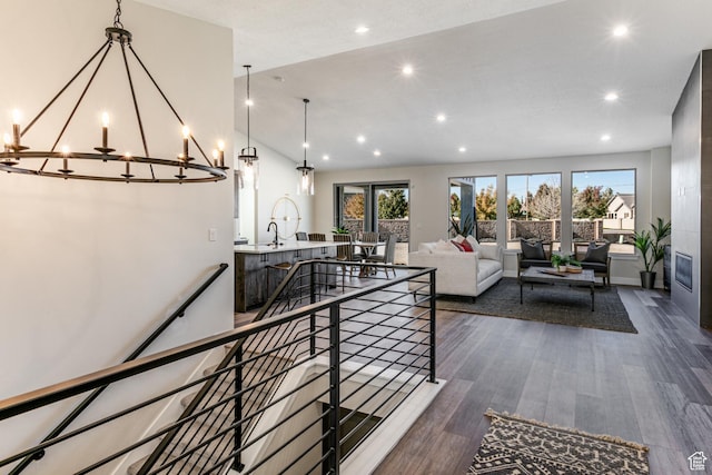 11202 S 1000 E Unit 3, Sandy, UT 84094 - living room featuring vaulted ceiling and dark hardwood / wood-style floors