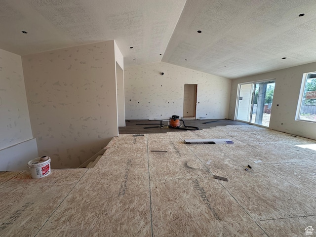 11202 S 1000 E Unit 3, Sandy, UT 84094 - empty room featuring lofted ceiling and a textured ceiling