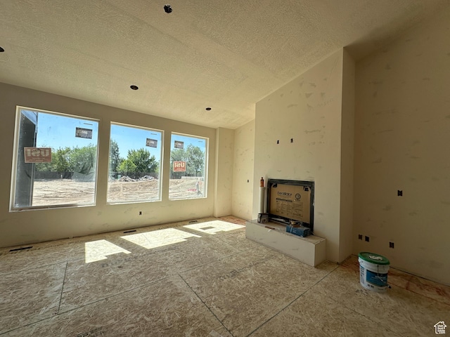 11202 S 1000 E Unit 3, Sandy, UT 84094 - unfurnished living room featuring a textured ceiling