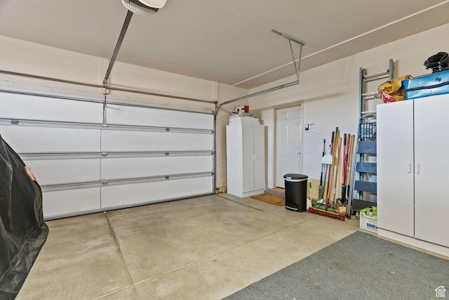garage featuring a garage door opener