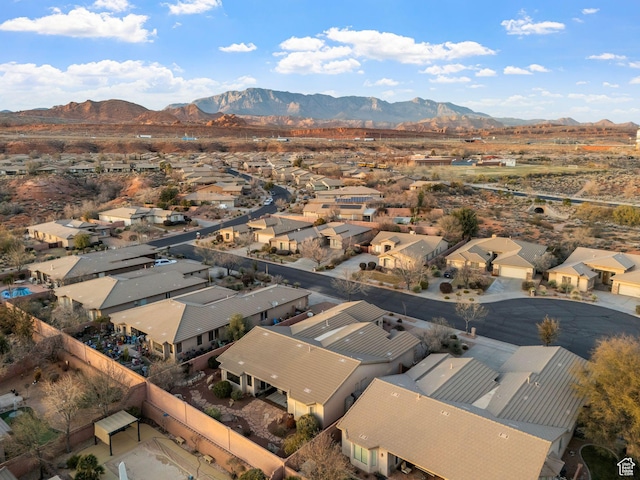 drone / aerial view featuring a mountain view