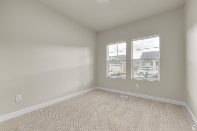 11878 S Golden Pine Ln, Riverton, UT 84065 - spare room featuring light colored carpet