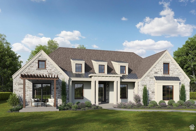 view of front of home with a front yard, a standing seam roof, stone siding, a patio area, and metal roof