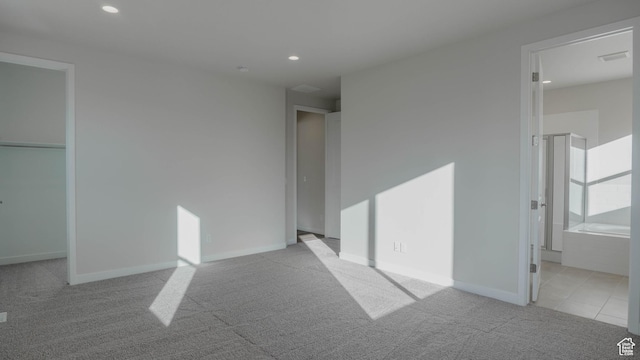 877 W Sika Cir S Unit 203, Saratoga Springs, UT 84045 - unfurnished bedroom featuring recessed lighting, baseboards, carpet floors, and connected bathroom
