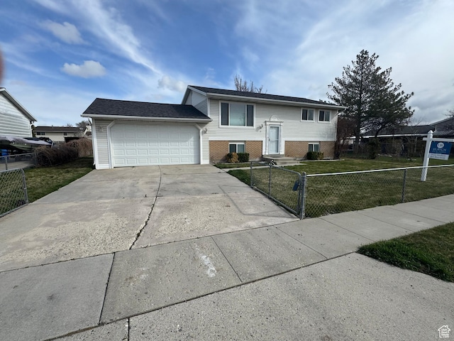 1838 W 13070 S, Riverton, UT 84065 - raised ranch with an attached garage, driveway, a fenced front yard, a front yard, and brick siding