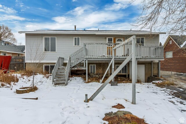 241 E Utah Ave, Tooele, UT 84074 - back of house featuring stairs, a deck, and fence