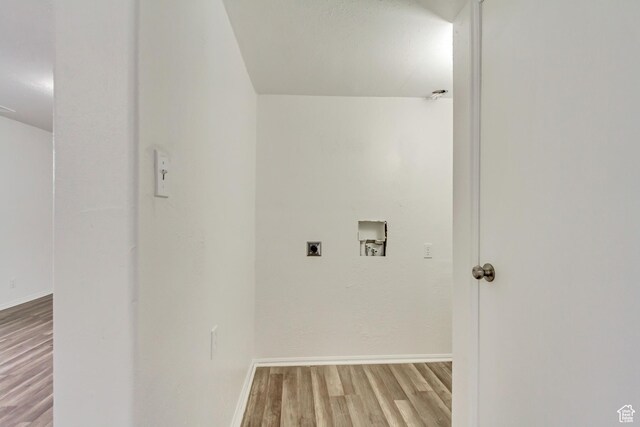 241 E Utah Ave, Tooele, UT 84074 - laundry room featuring electric dryer hookup, washer hookup, wood finished floors, baseboards, and laundry area