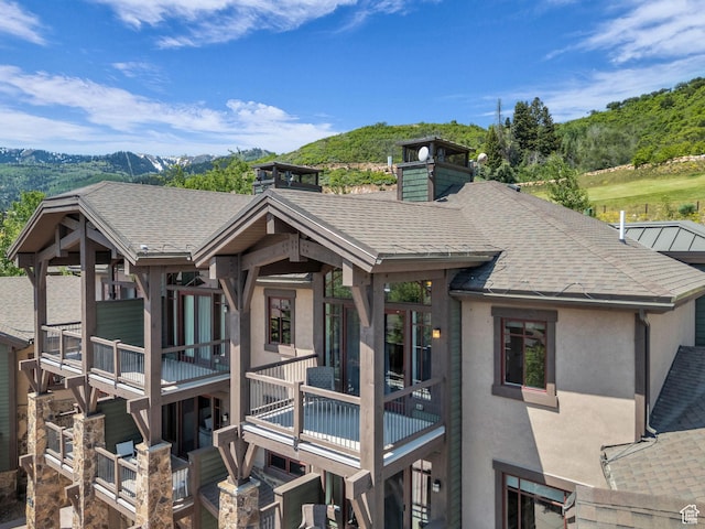 4163 Fairway Ln Unit B-4, Park City, UT 84098 - back of house featuring stucco siding, a mountain view, and roof with shingles