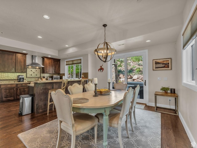 4163 Fairway Ln Unit B-4, Park City, UT 84098 - dining area featuring dark wood-type flooring, a chandelier, recessed lighting, and baseboards