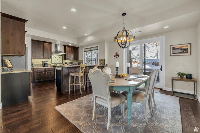 4163 Fairway Ln Unit B-4, Park City, UT 84098 - dining space featuring a notable chandelier and dark hardwood / wood-style flooring