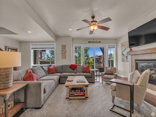 4163 Fairway Ln Unit B-4, Park City, UT 84098 - living area featuring ceiling fan, a tiled fireplace, baseboards, and recessed lighting
