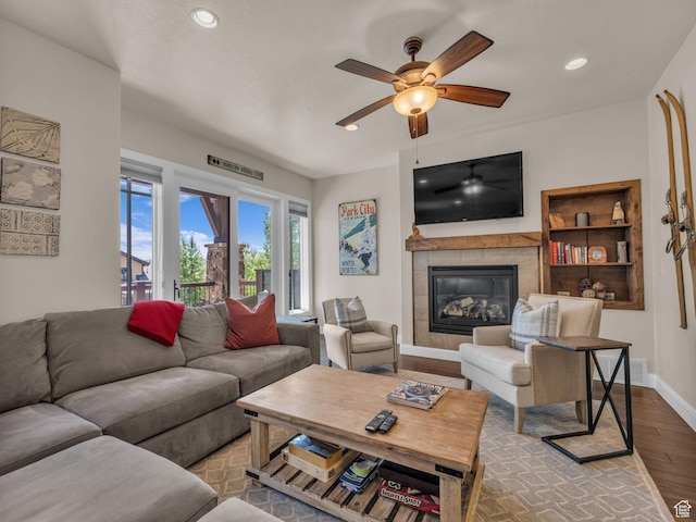 4163 Fairway Ln Unit B-4, Park City, UT 84098 - living room featuring wood finished floors, ceiling fan, a glass covered fireplace, baseboards, and recessed lighting