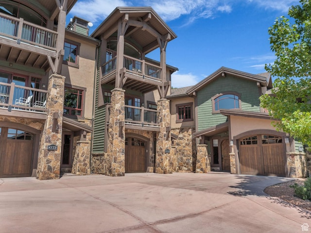 4163 Fairway Ln Unit B-4, Park City, UT 84098 - view of building exterior with concrete driveway and an attached garage