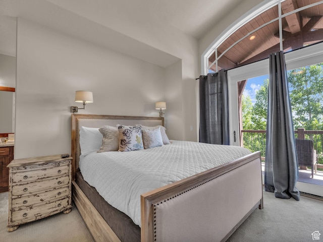 4163 Fairway Ln Unit B-4, Park City, UT 84098 - bedroom featuring light carpet, multiple windows, access to exterior, and lofted ceiling