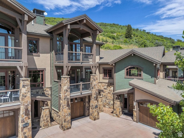4163 Fairway Ln Unit B-4, Park City, UT 84098 - view of building exterior featuring driveway and an attached garage