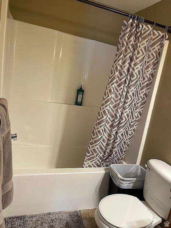 bathroom featuring toilet