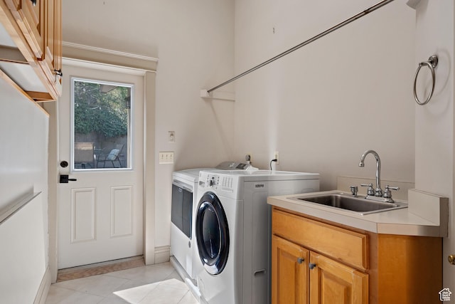 1204 E Gilmer Dr, Salt Lake City, UT 84105 - laundry room featuring a sink, cabinet space, separate washer and dryer, and light tile patterned flooring