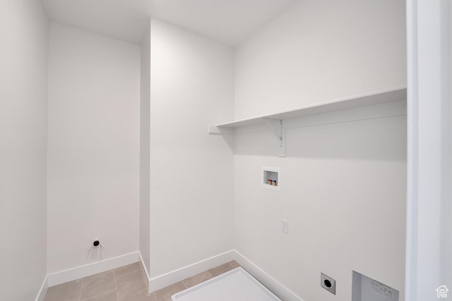 6184 W Teton Ranch Dr S Unit 304, Herriman, UT 84096 - laundry room featuring hookup for a washing machine, electric dryer hookup, baseboards, and light tile patterned floors