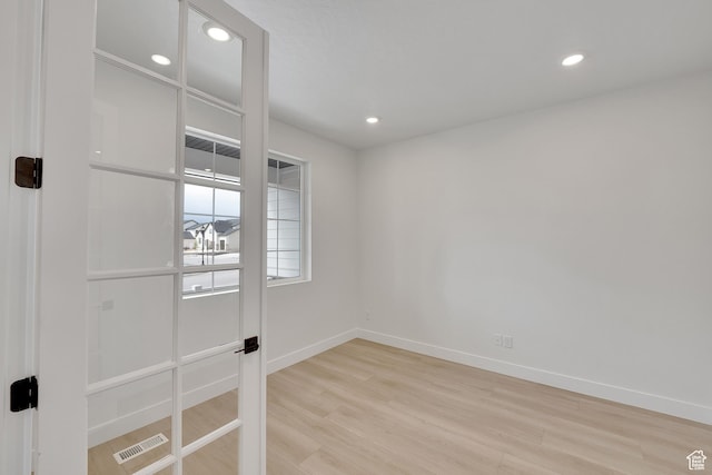 6184 W Teton Ranch Dr S Unit 304, Herriman, UT 84096 - unfurnished bedroom with light wood-style floors, baseboards, and recessed lighting