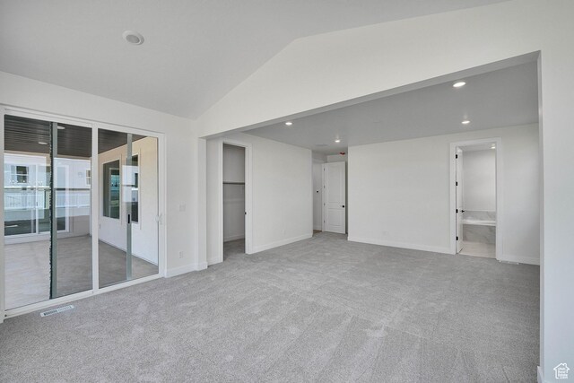 6184 W Teton Ranch Dr S Unit 304, Herriman, UT 84096 - spare room featuring vaulted ceiling, carpet floors, recessed lighting, and baseboards