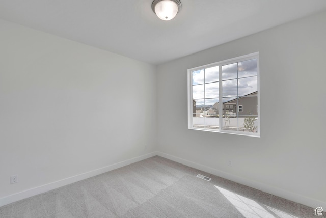6184 W Teton Ranch Dr S Unit 304, Herriman, UT 84096 - spare room with carpet floors and baseboards