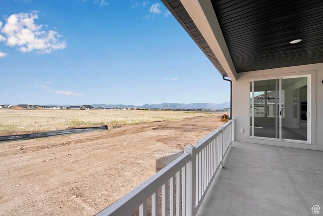 6184 W Teton Ranch Dr S Unit 304, Herriman, UT 84096 - balcony featuring a mountain view and a rural view
