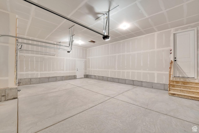 6184 W Teton Ranch Dr S Unit 304, Herriman, UT 84096 - garage featuring a garage door opener