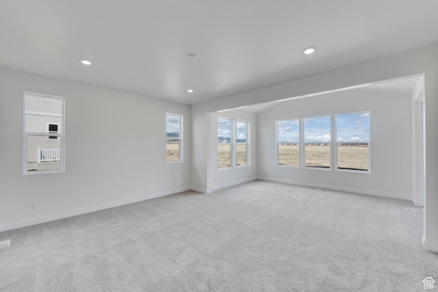 6184 W Teton Ranch Dr S Unit 304, Herriman, UT 84096 - empty room featuring light colored carpet, baseboards, and recessed lighting