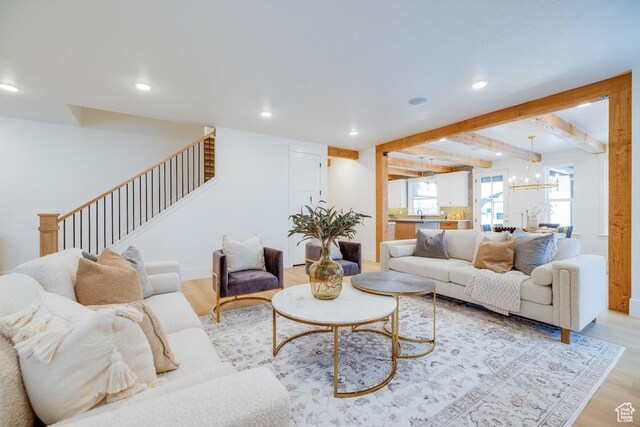 1292 S 1220 E, Salem, UT 84653 - living area featuring recessed lighting, light wood-style flooring, stairs, and an inviting chandelier