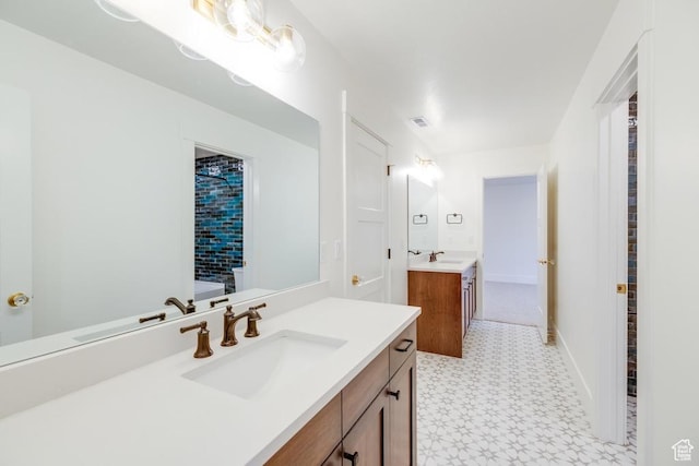 1292 S 1220 E, Salem, UT 84653 - full bathroom featuring two vanities, tile patterned floors, baseboards, and a sink