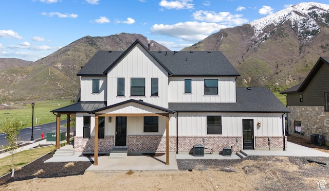 1292 S 1220 E, Salem, UT 84653 - view of front of property with a mountain view, central air condition unit, brick siding, a shingled roof, and board and batten siding