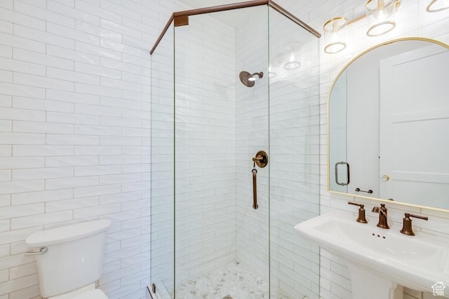 1292 S 1220 E, Salem, UT 84653 - bathroom featuring tile walls, toilet, a stall shower, and a sink