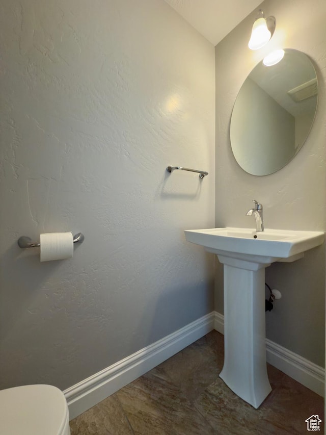 1855 N 860 W, Orem, UT 84057 - bathroom with baseboards, toilet, and a sink