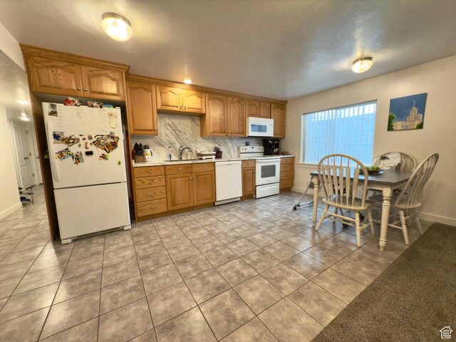 1855 N 860 W, Orem, UT 84057 - kitchen featuring white appliances, light countertops, light tile patterned flooring, and baseboards