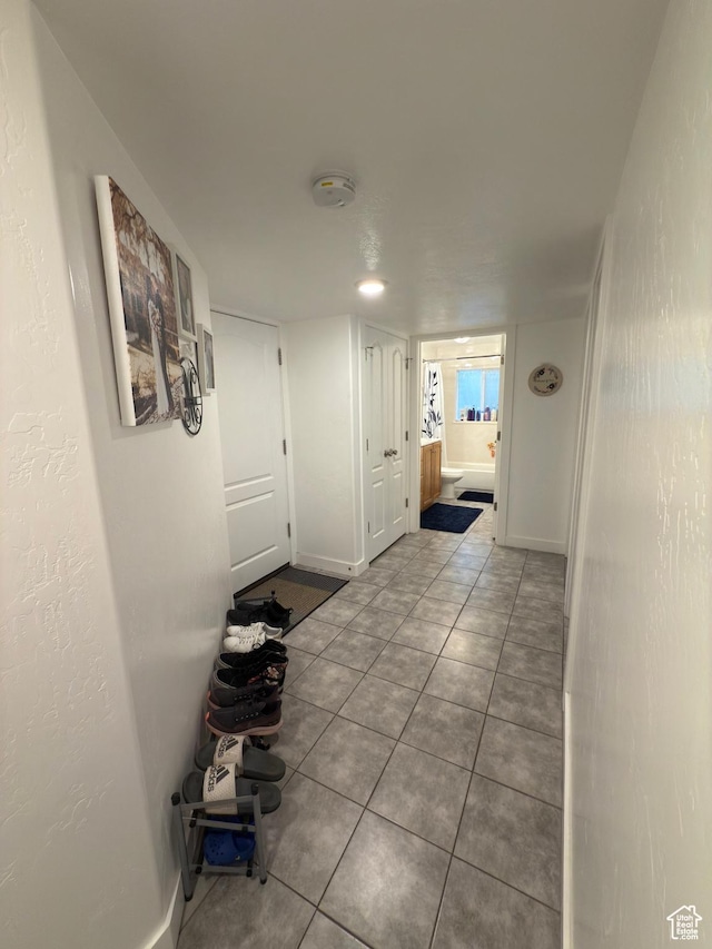 1855 N 860 W, Orem, UT 84057 - hallway with tile patterned floors and baseboards