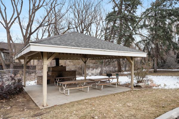 snow covered patio featuring a gazebo