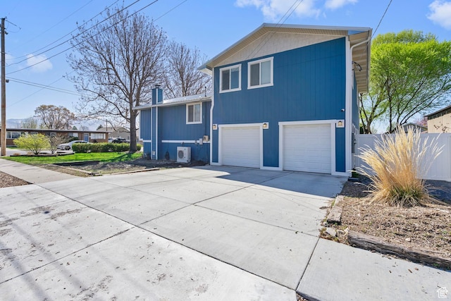 506 S 330 E, American Fork, UT 84003 - view of front of home featuring fence, a garage, driveway, and a chimney