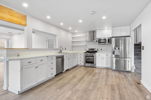 506 S 330 E, American Fork, UT 84003 - kitchen with wall chimney range hood, light wood-type flooring, open shelves, and appliances with stainless steel finishes