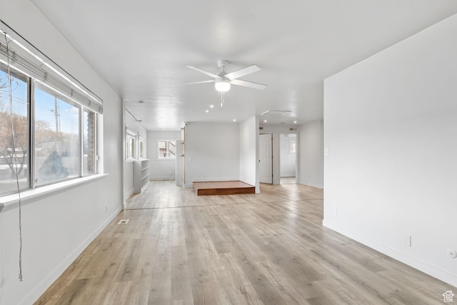 506 S 330 E, American Fork, UT 84003 - unfurnished living room featuring light wood-type flooring, baseboards, a ceiling fan, and visible vents