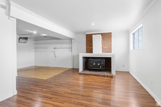 506 S 330 E, American Fork, UT 84003 - unfurnished living room featuring visible vents, baseboards, and wood finished floors
